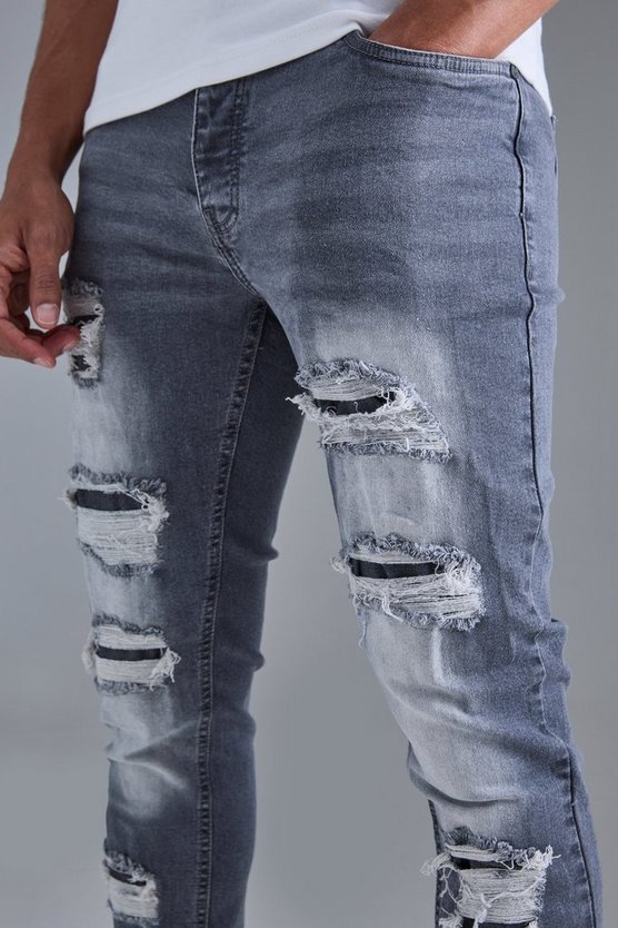 Graue Skinny Jeans mit Rissen