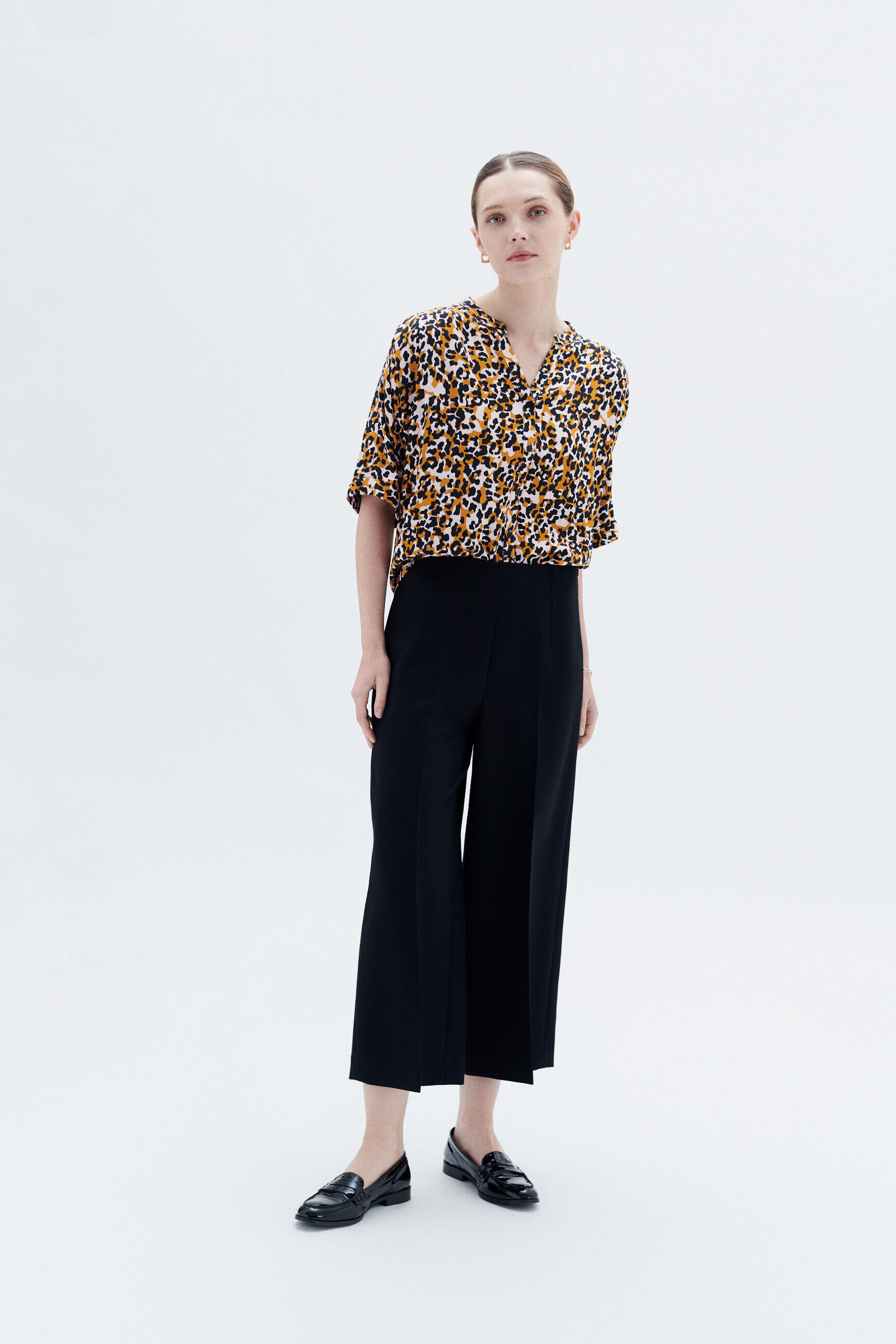 Pantalon pierce noir femme