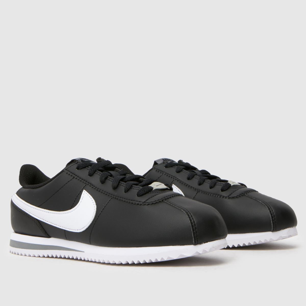Nike svarta och vita Cortez ungdomsskor