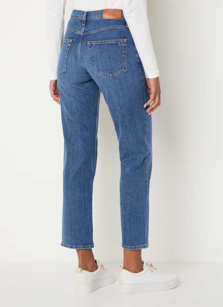 Calça jeans Tommy Hilfiger de cintura alta e perna reta com lavagem média.