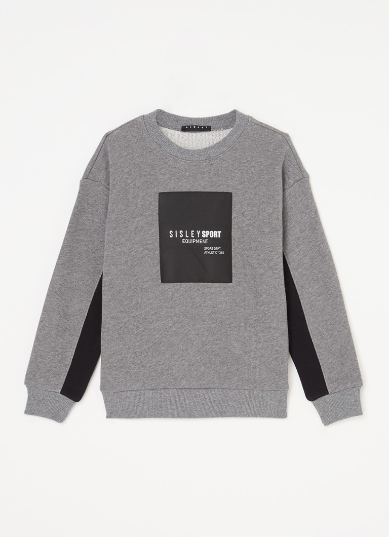 Sisley Young -neulepusero, jossa logobrodeeraus