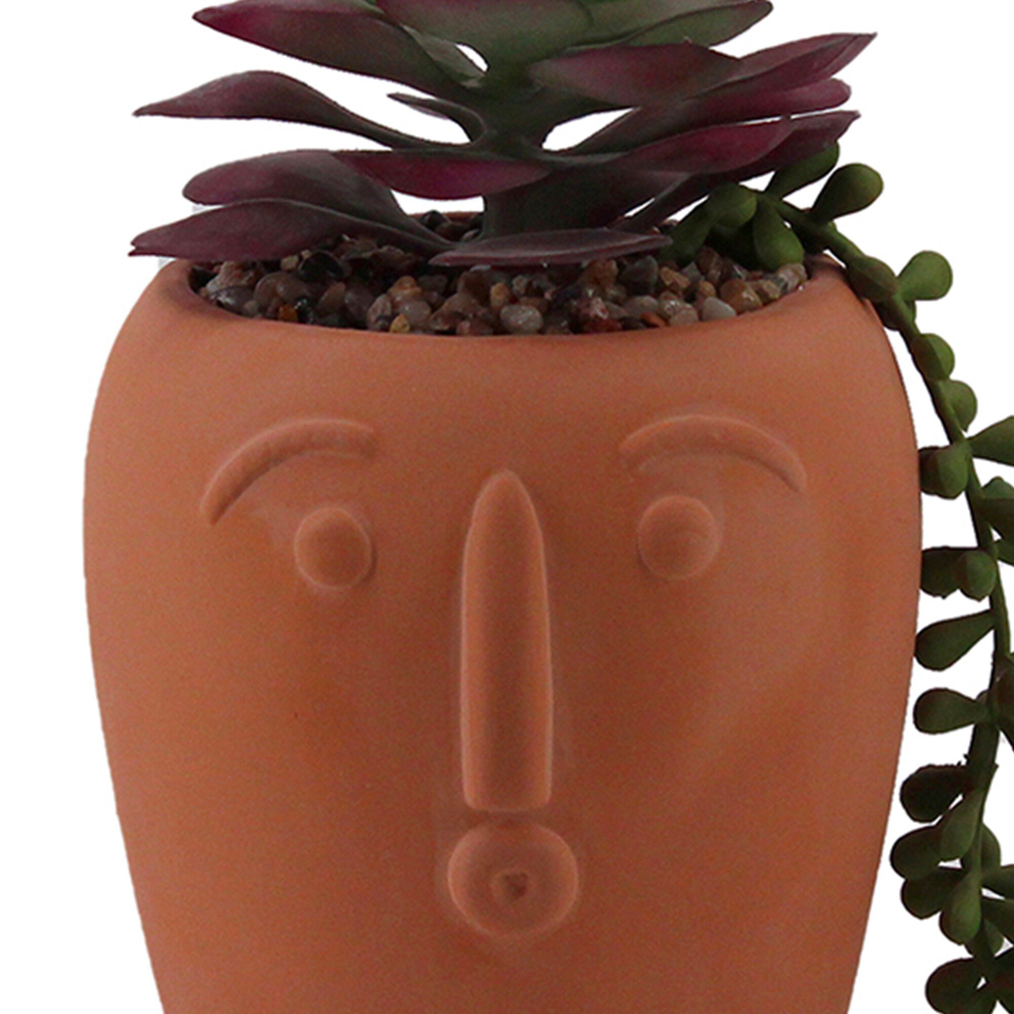 Plante artificielle et pot en terre cuite