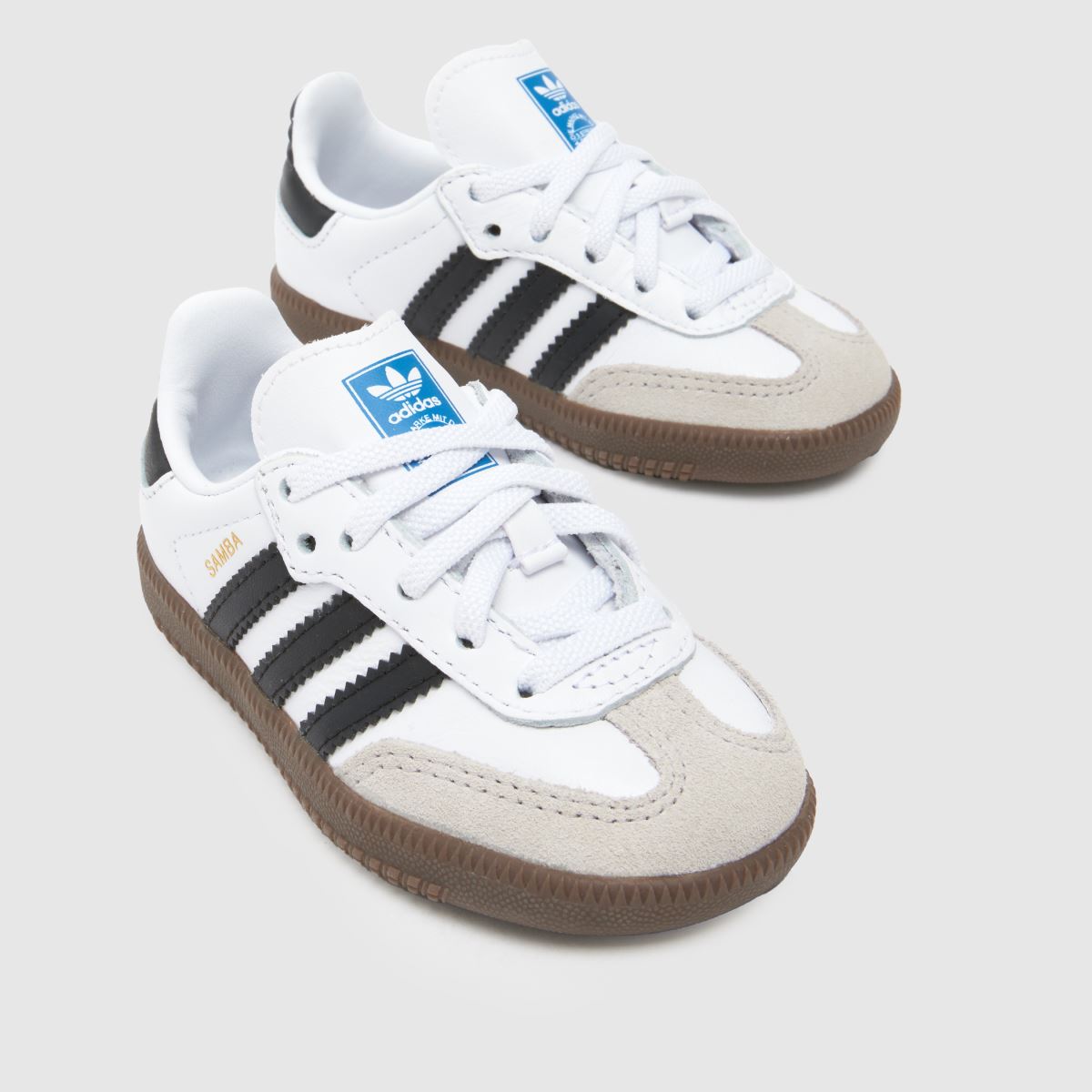 adidas vita och svarta samba och småbarnsskor