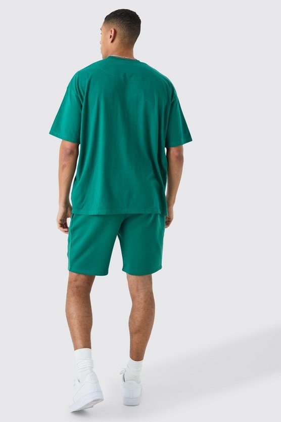 Lockere mittellange Shorts mit Applikation