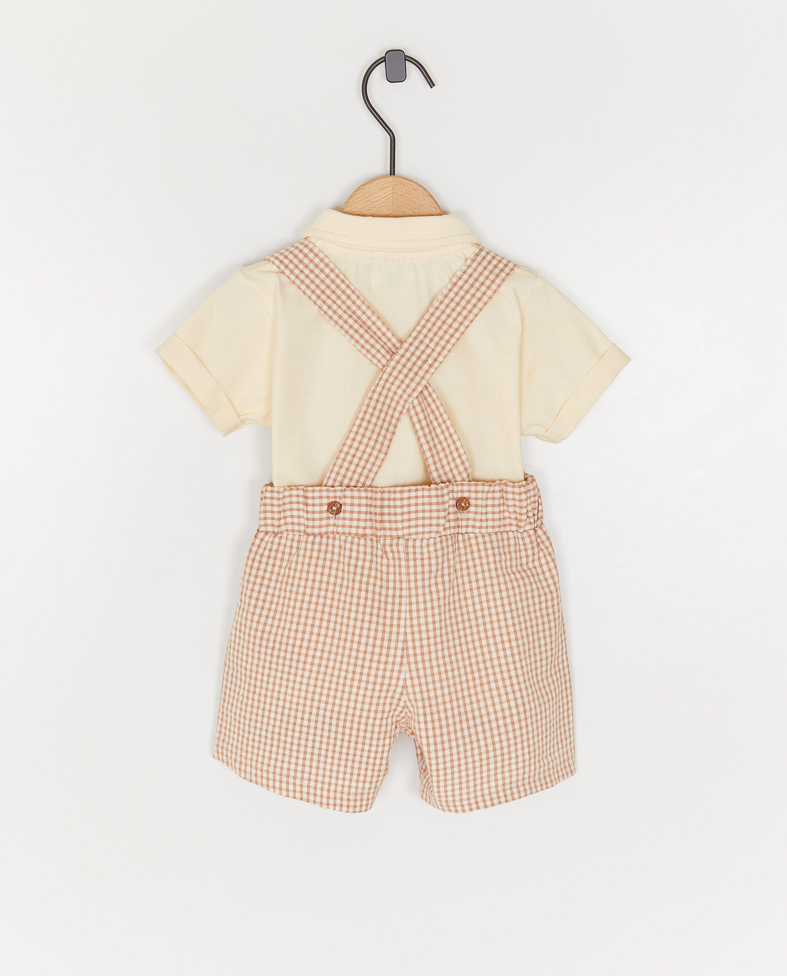 Set Dirkje: polo + salopetă albă