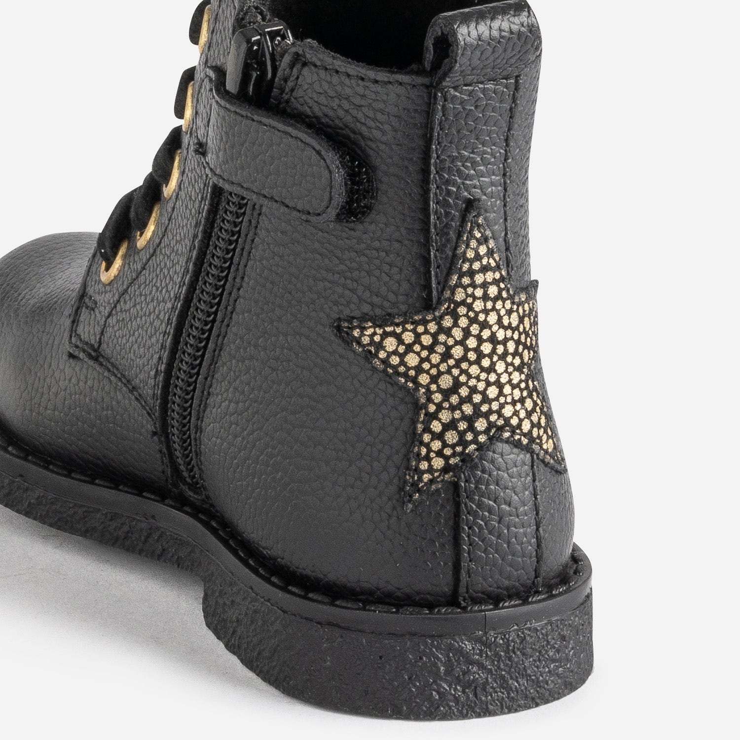 Bottine éco-conçue BUGGY noire en cuir décor étoile