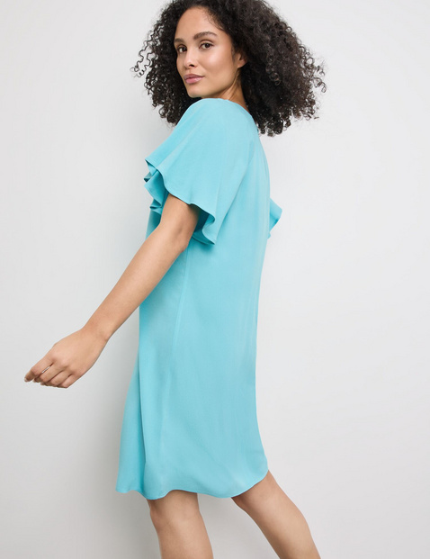 Fließendes Kleid mit Flügelärmeln