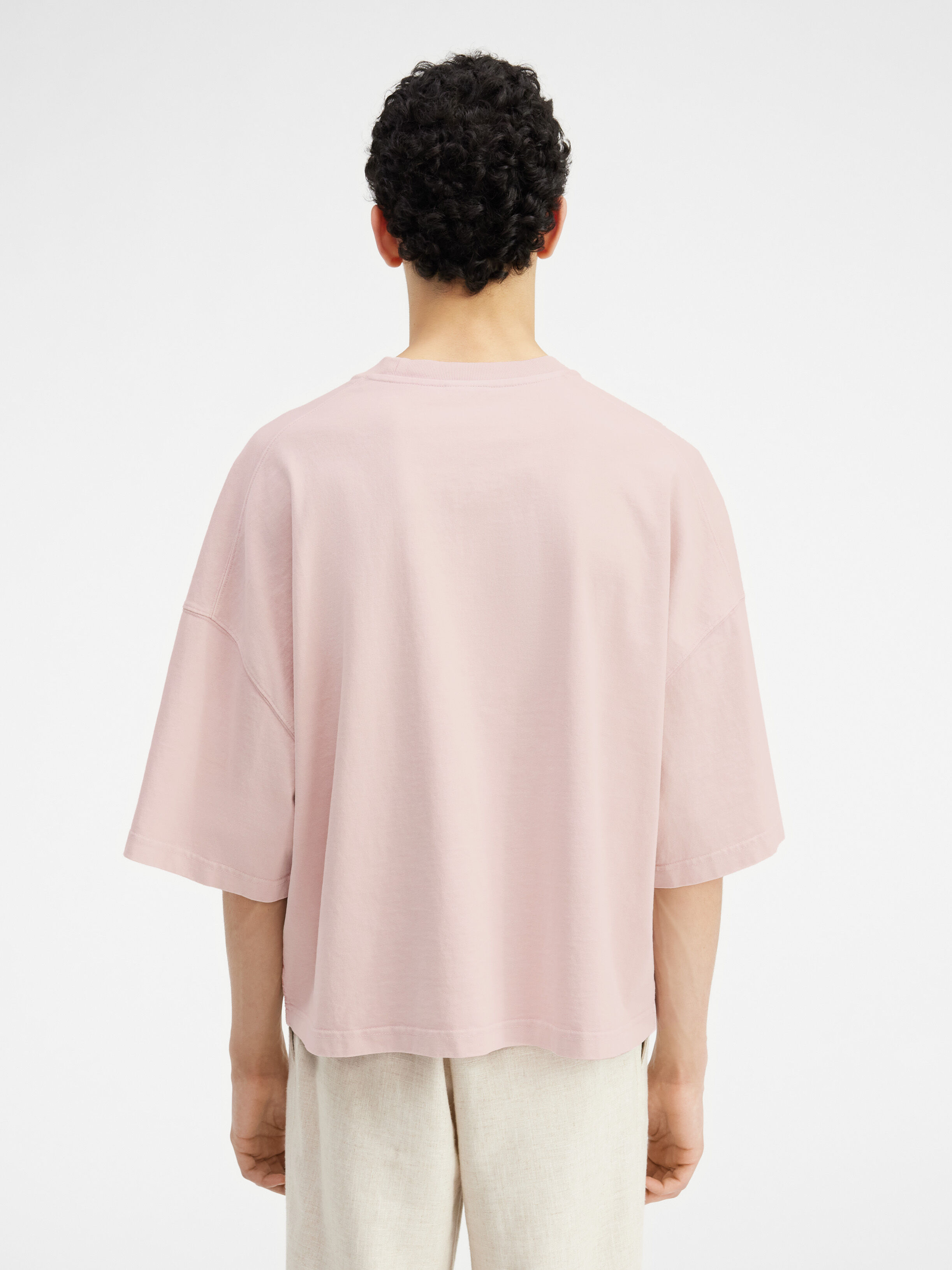 Le t-shirt Corto