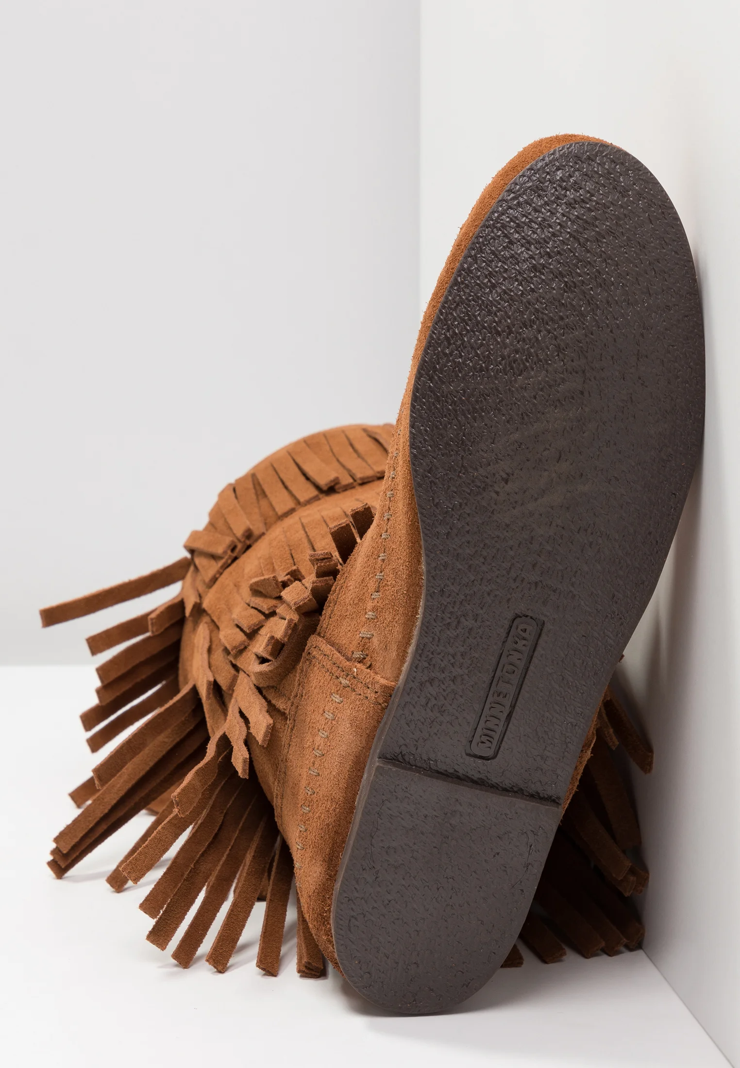 Botas altas Minnetonka de 3 capas con flecos
