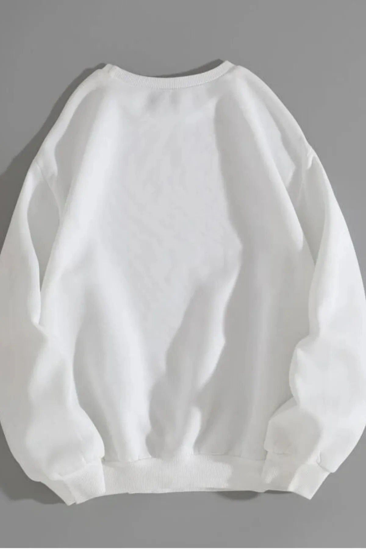 MODAGEN  Unisex-Sweatshirt „The Best“ in Weiß mit Rundhalsausschnitt