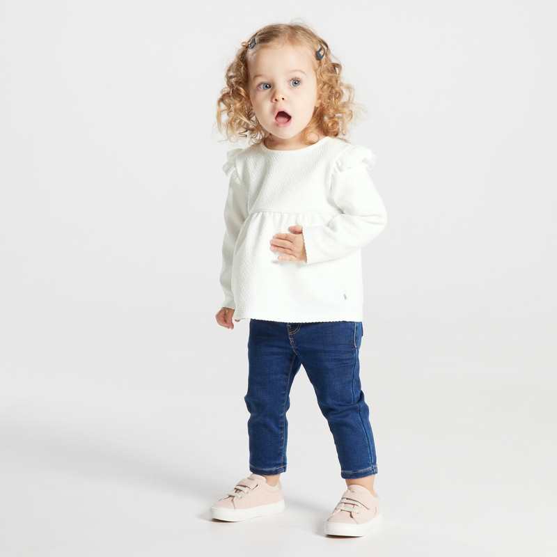 Blouse unie tissu gaufré à volants blanche bébé fille