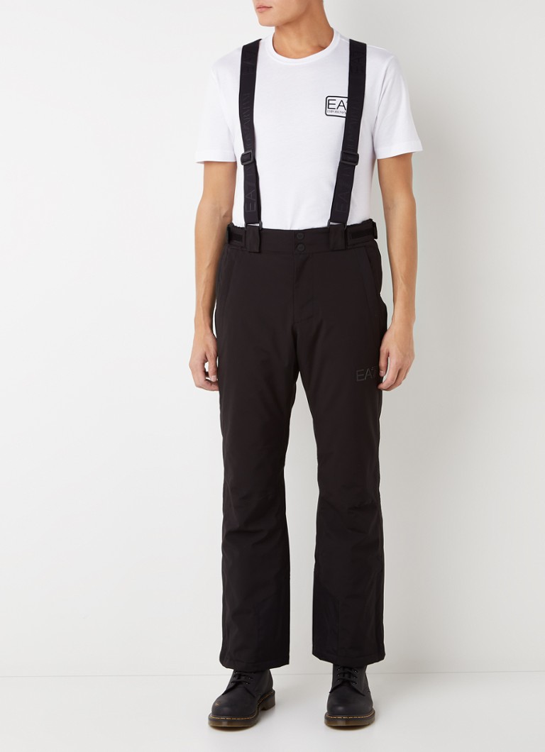 Pantaloni de schi Emporio Armani cu croială dreaptă, cu buzunare cu fermoar și bretele detașabile.