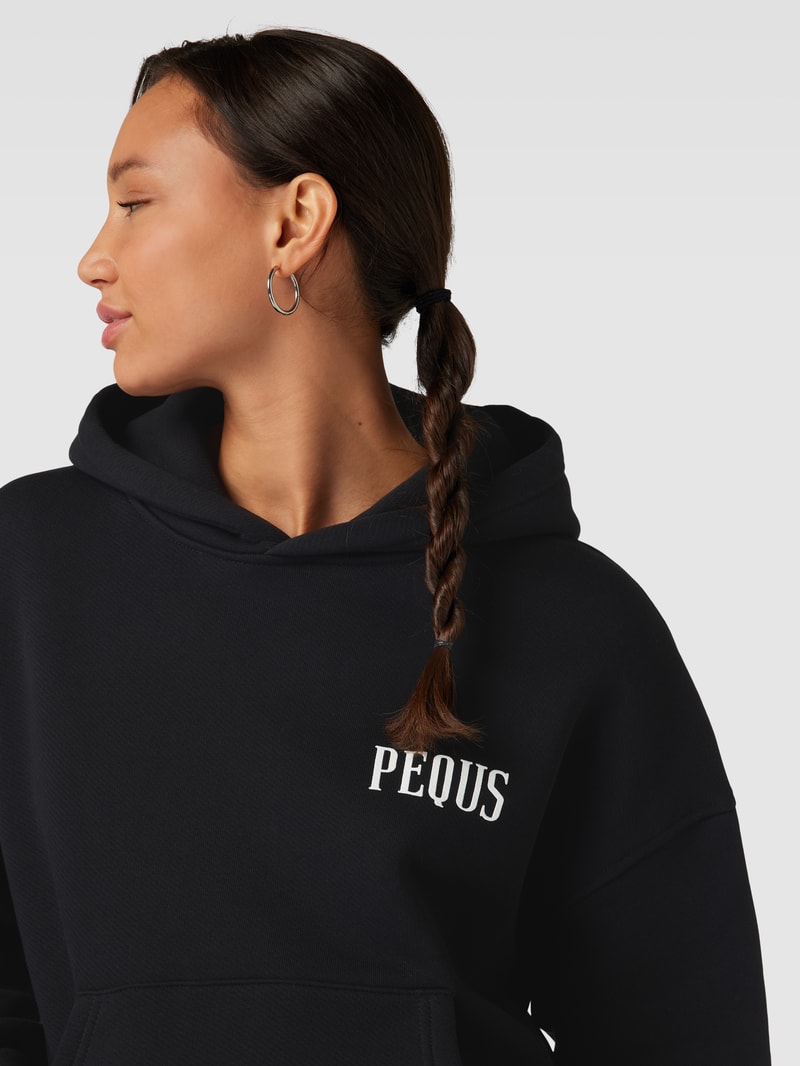 Hoodie mit Label-Print Modell 'Island of Heartbreaks' in schwarz