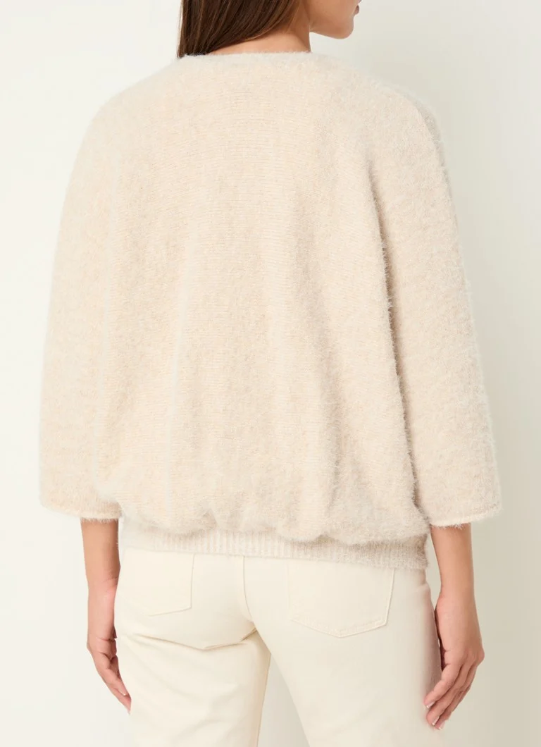 Tricou Jenetta cu o cusătură delicată, confecționat la Moscova dintr-un amestec de lână de alpaca.