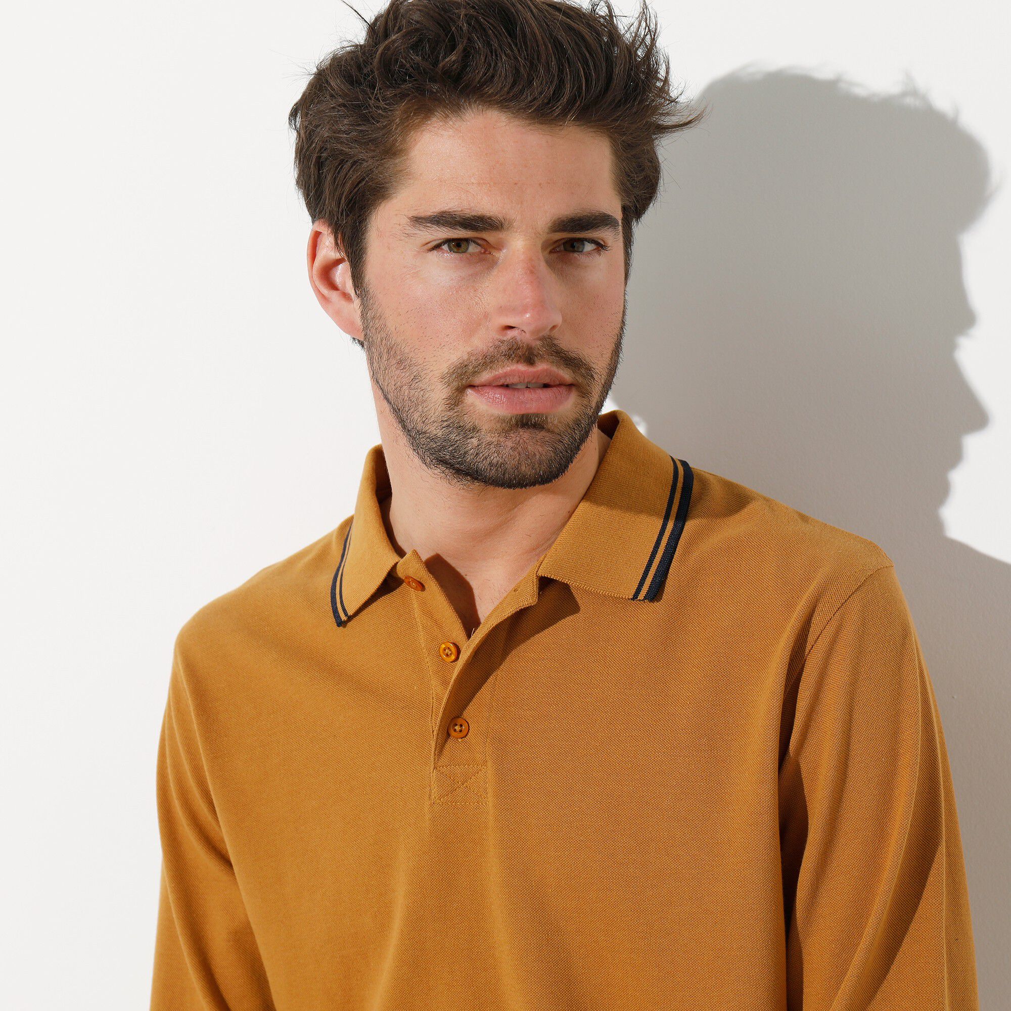 Polo uni maille piquée manches longues