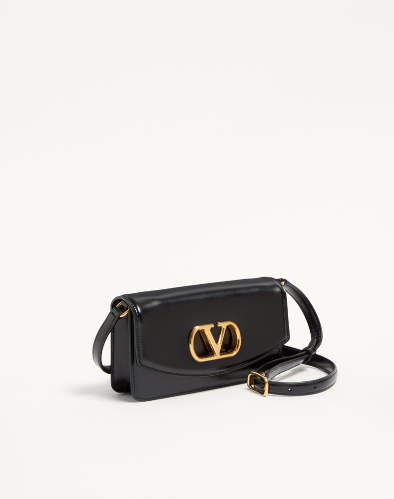 Valentino Garavani Vain Clutch i skinnende kalveskind