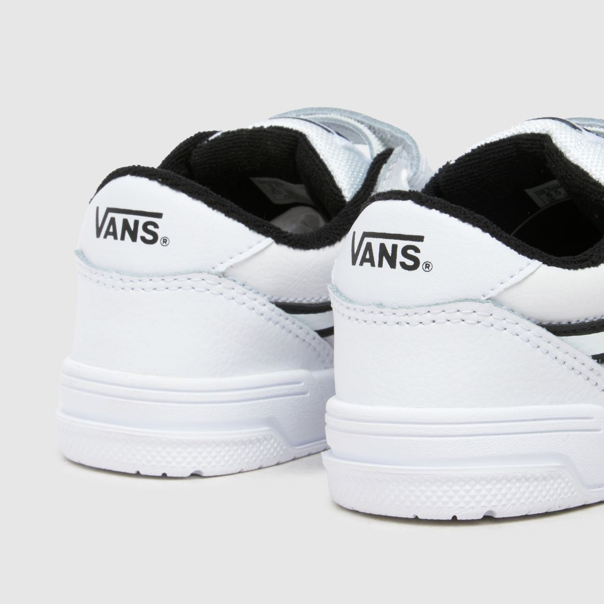 Vans vita och svarta Hylane v småbarnsskor
