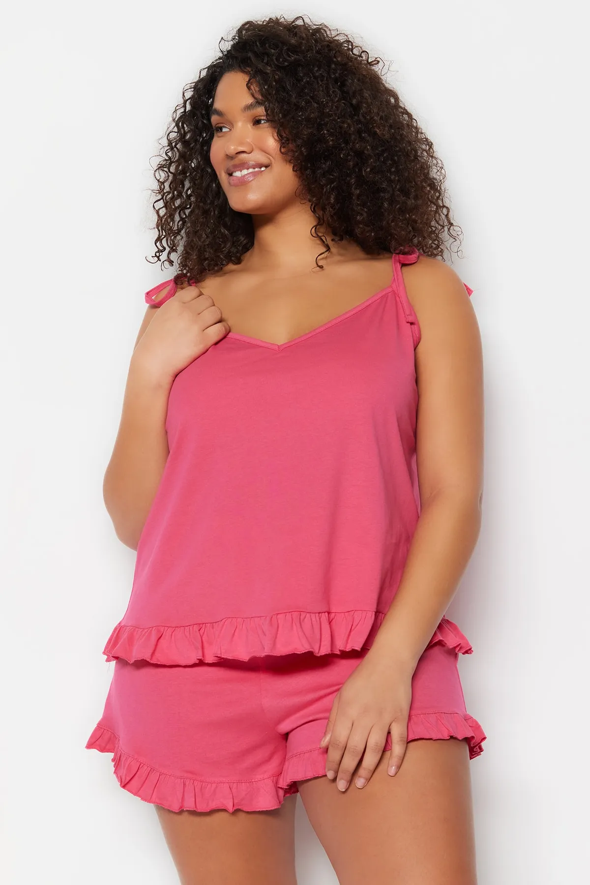Trendyol Curve  Fuchsiafarbenes Pyjama-Set mit Strick- und Schnürdetails TBBSS22PT0564