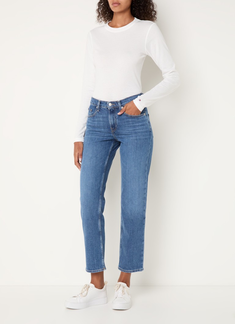 Calça jeans Tommy Hilfiger de cintura alta e perna reta com lavagem média.