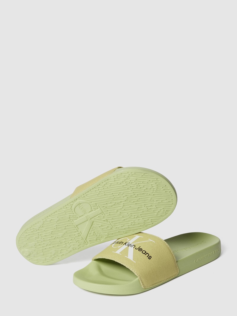 Slides mit Label-Print in neon gelb