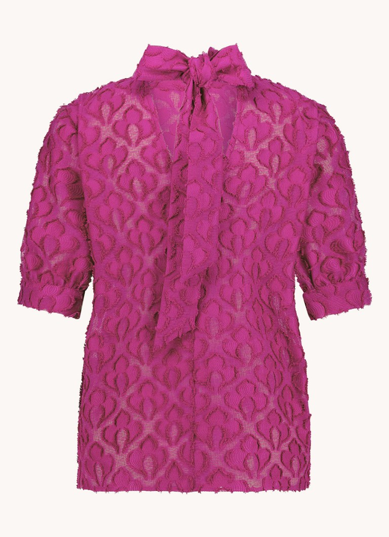 Top Alia de la Studio Anneloes, cu imprimeu jacquard și fundă la decolteu.