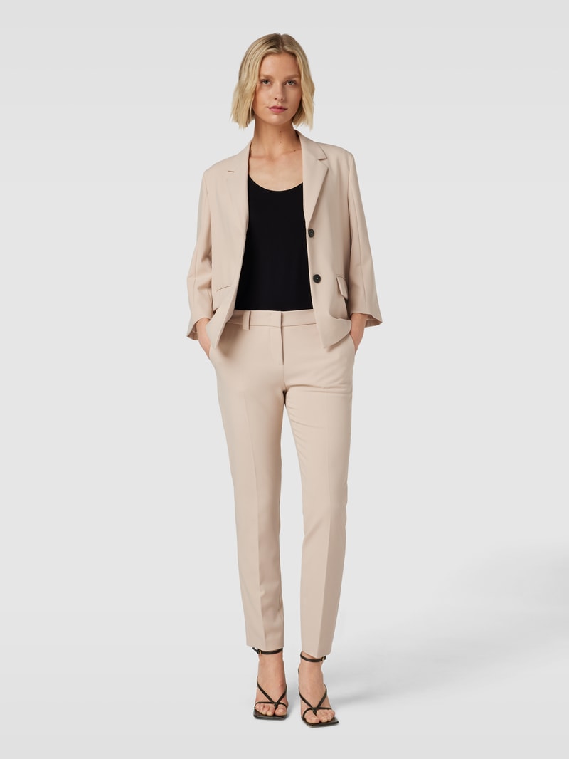 Hose mit seitlichen Eingrifftaschen in beige