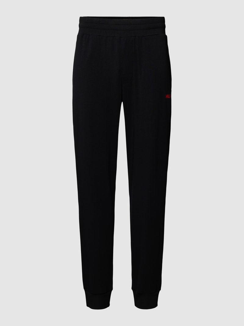 Sweatpants in unifarbenem Design mit elastischem Bund in schwarz