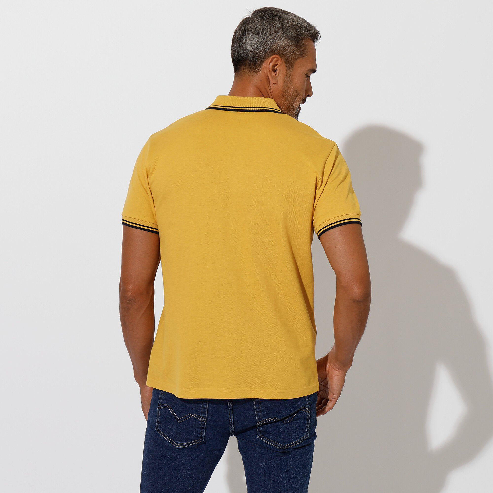 Polo uni maille piquée manches courtes