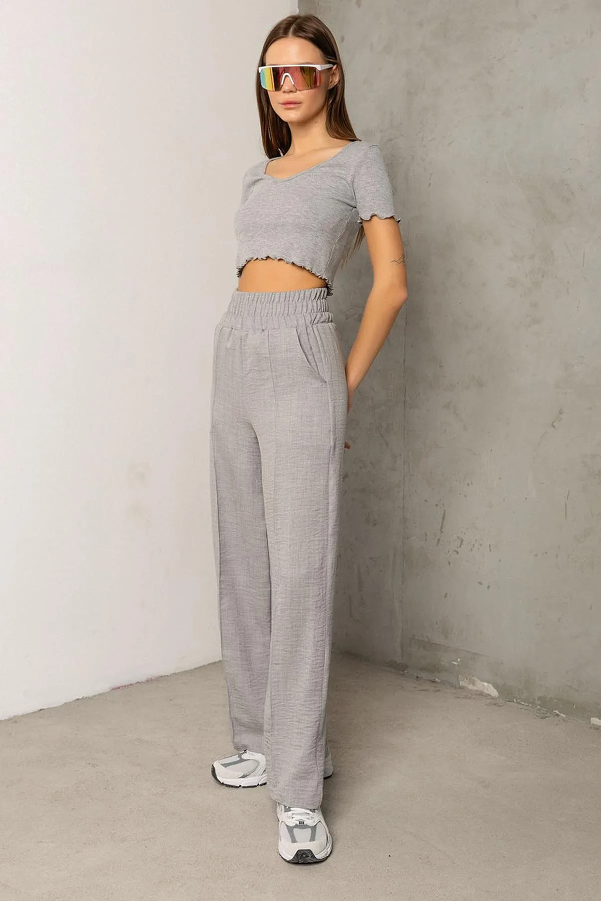 Domoda  Dekorative elastische Taille Weites Bein Doppeltasche Baumwolle Damenhose @Como