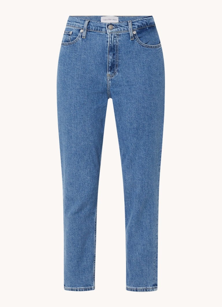 Blugi Calvin Klein mom fit, talie înaltă, croială scurtă, nuanță medie.