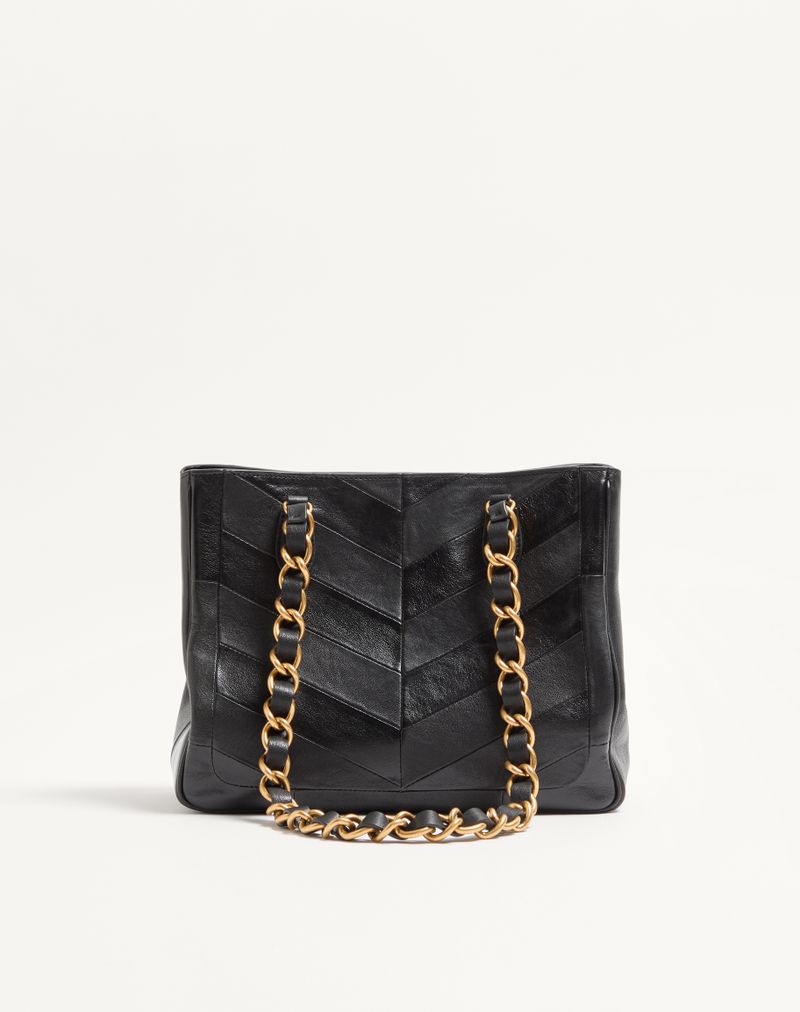 Bolsa de compras pequena Valentino Garavani Laseine em napa com estampa chevron.