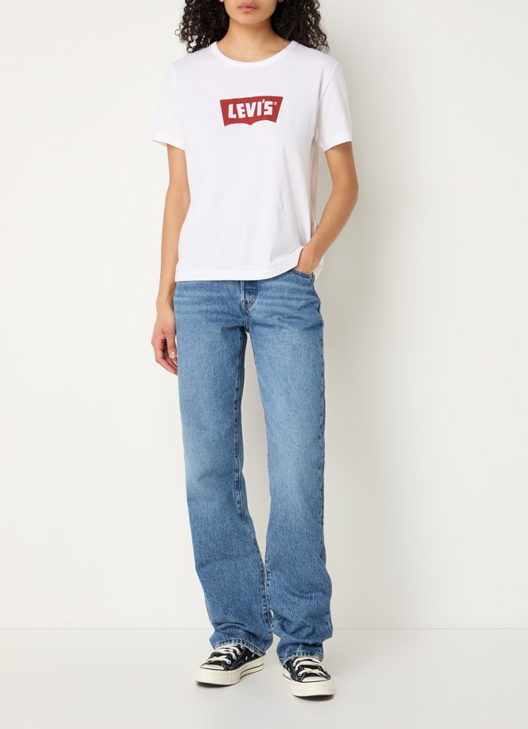 Blugi Levi's din anii '90, talie înaltă, croială dreaptă, spălare medie.