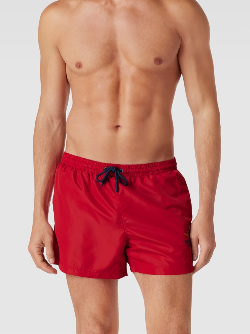 Badeshorts mit Label-Stitching Modell 'COSTUME' in rot