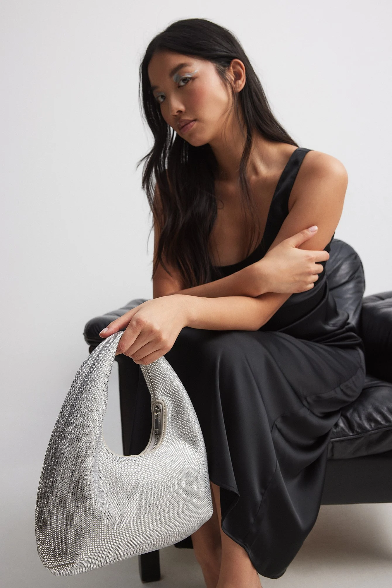 Glitzernde abgerundete Tasche