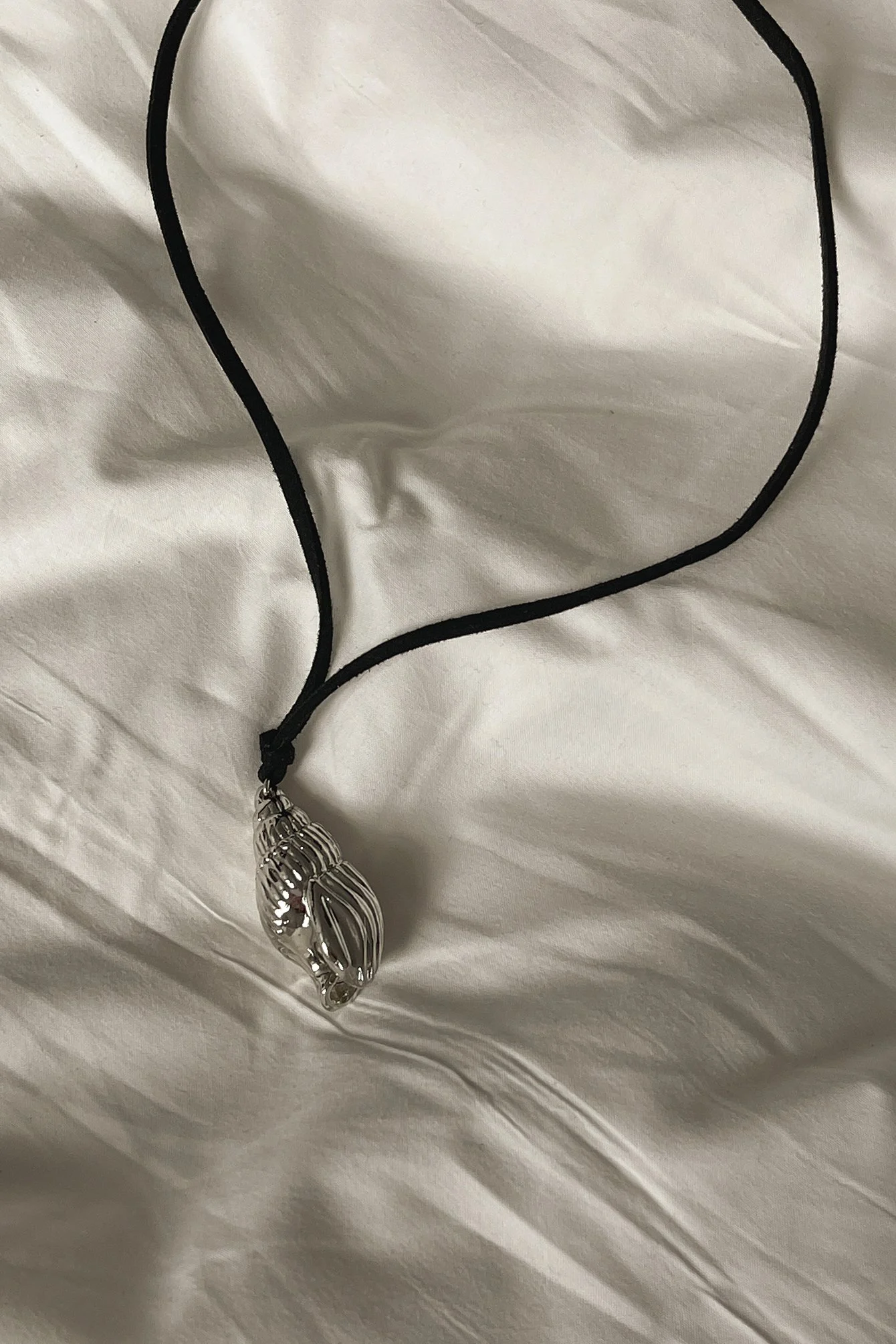 Kette mit Muschelanhänger
