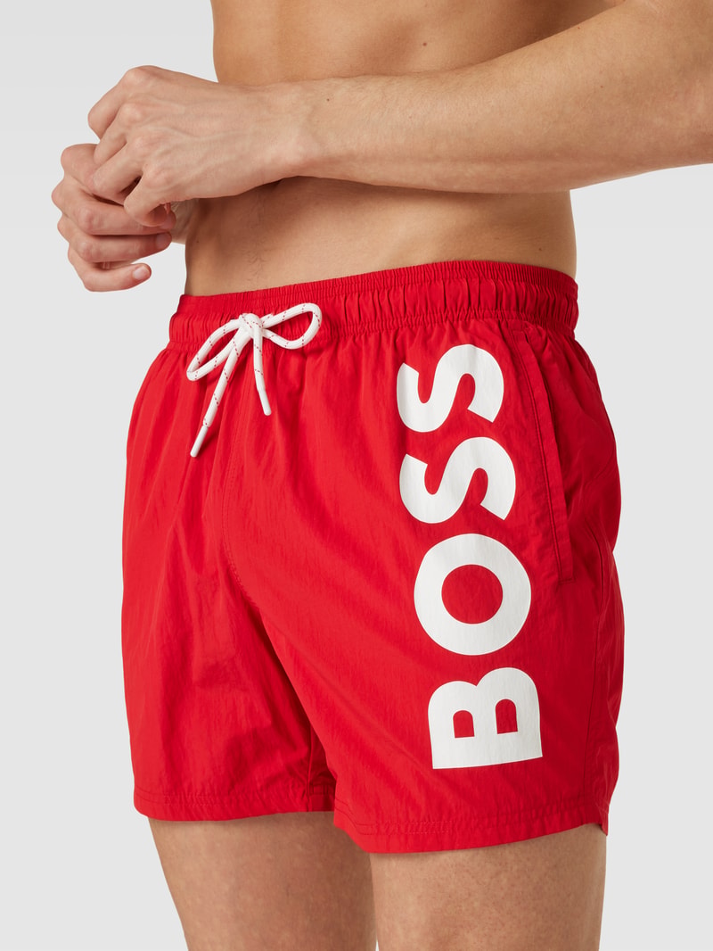 Badehose mit Label-Print Modell 'Octopus' in rot