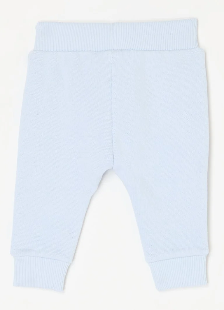 Pantaloni de trening Benetton cu croială conică și broderie.