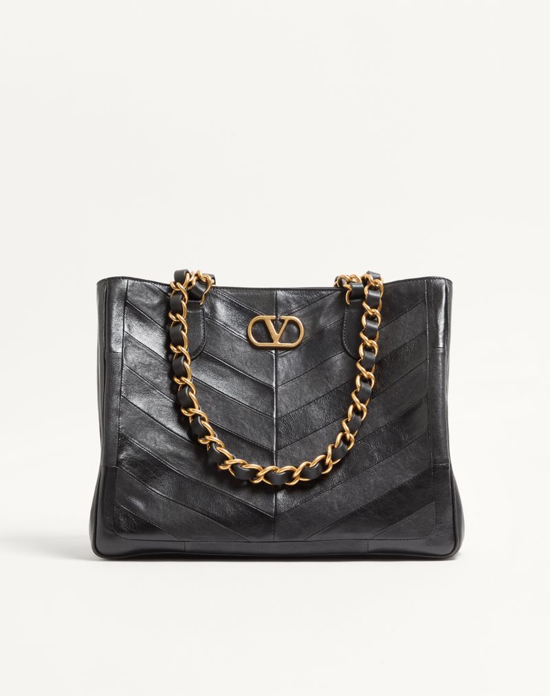 Valentino Garavani Laseine boodschappentas van nappaleer met chevronmotief.
