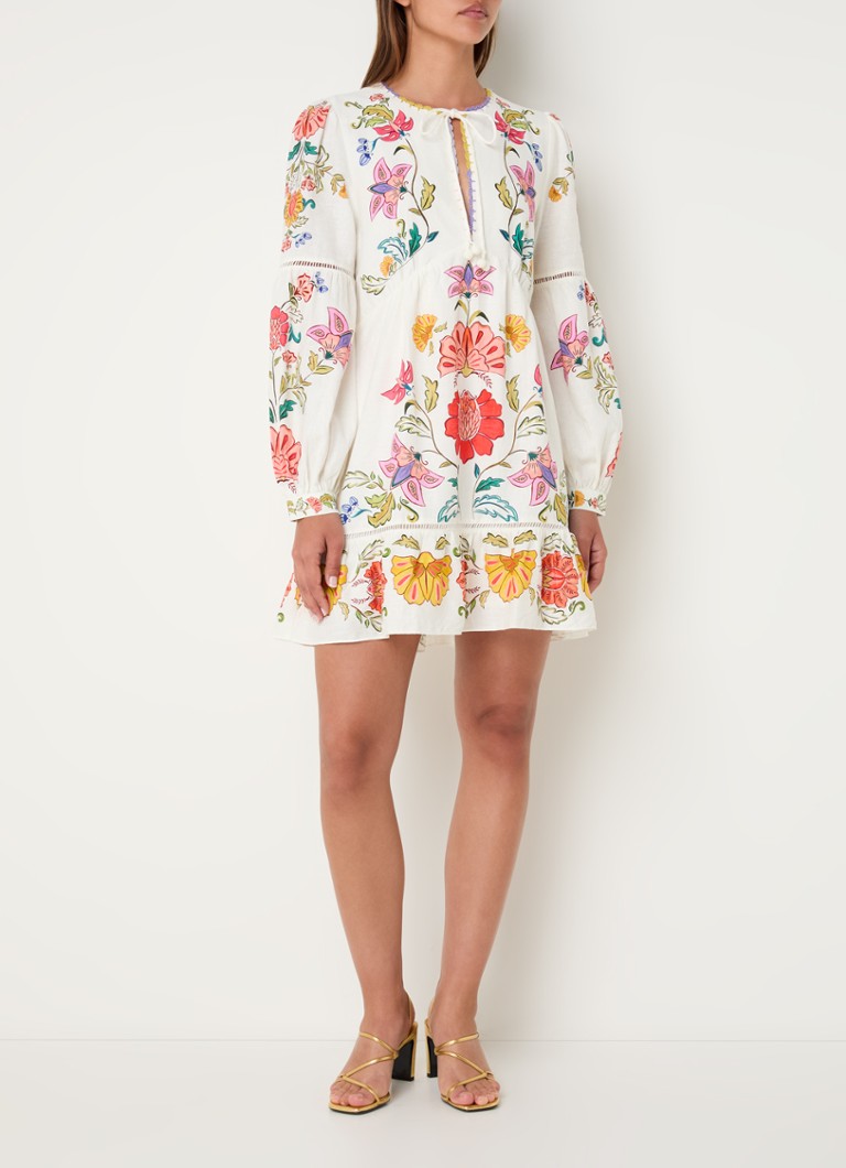 Vestido túnica corto de Farm Rio, confeccionado en una mezcla de lino, con estampado floral y mangas abullonadas.