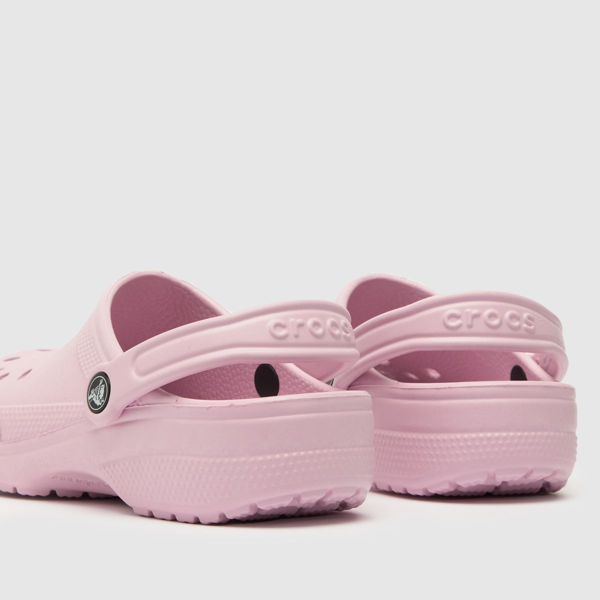 Crocs ljusrosa klassiska träskor för flickor och ungdomar