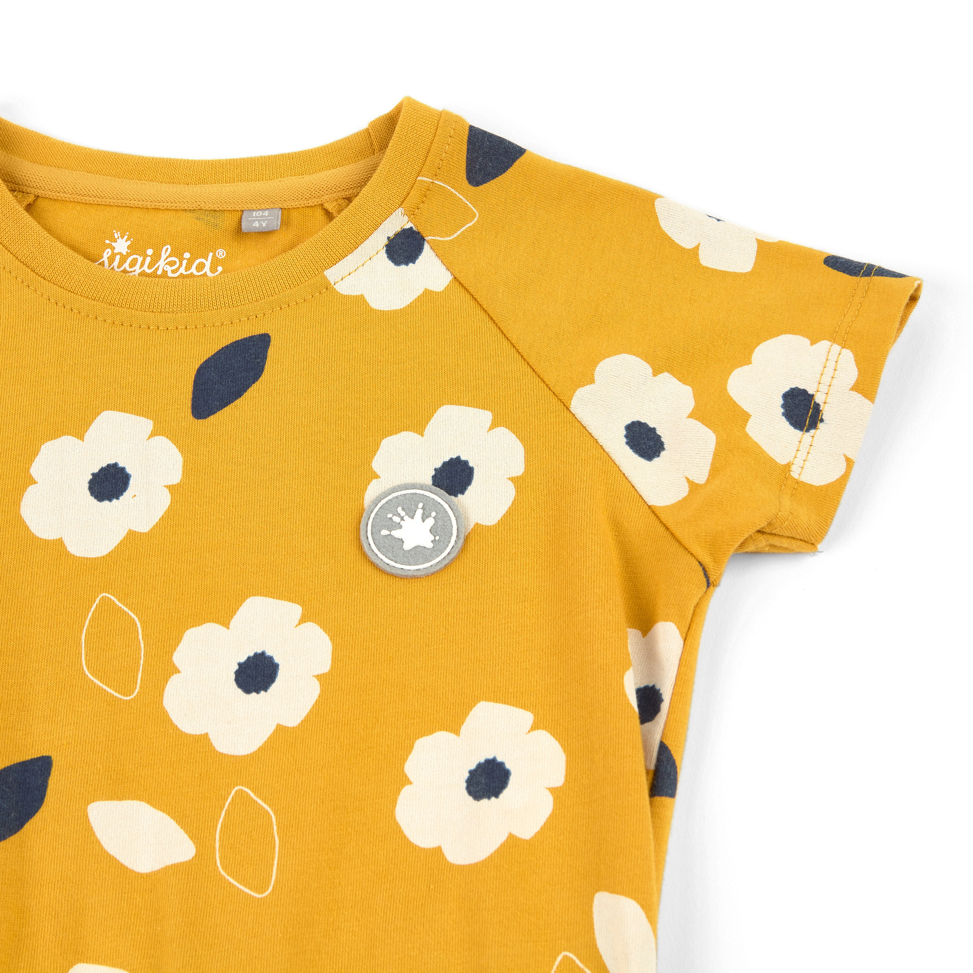 Gelbes Kinderkleid mit Blümchen bedruckt