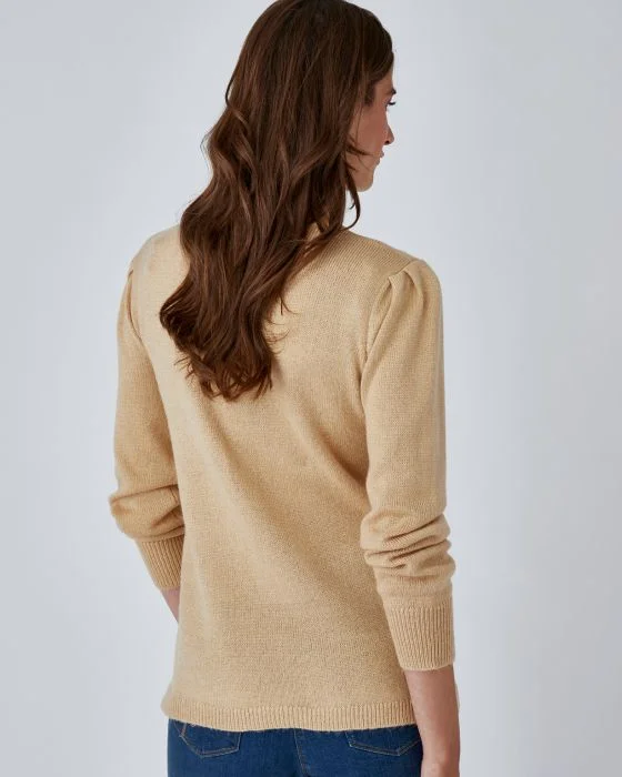 Pull brillant manches ballon.