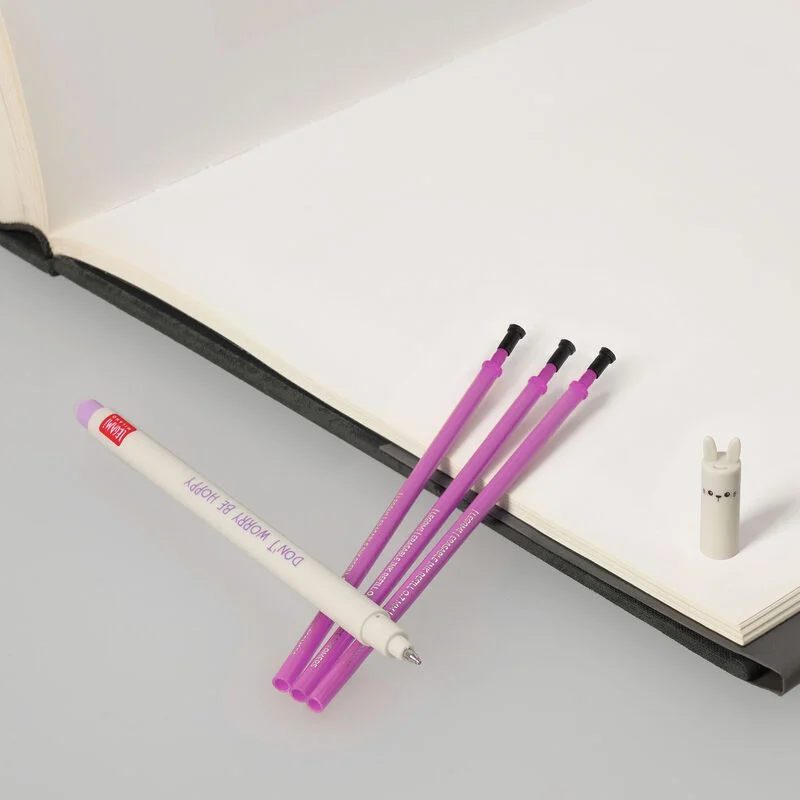 Juego de bolígrafos borrables con forma de conejito y recambio morado.