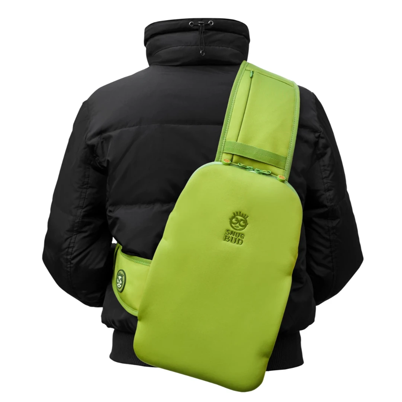 Snugbud Classic grün/orangefarbener Rucksack mit Wärmflasche
