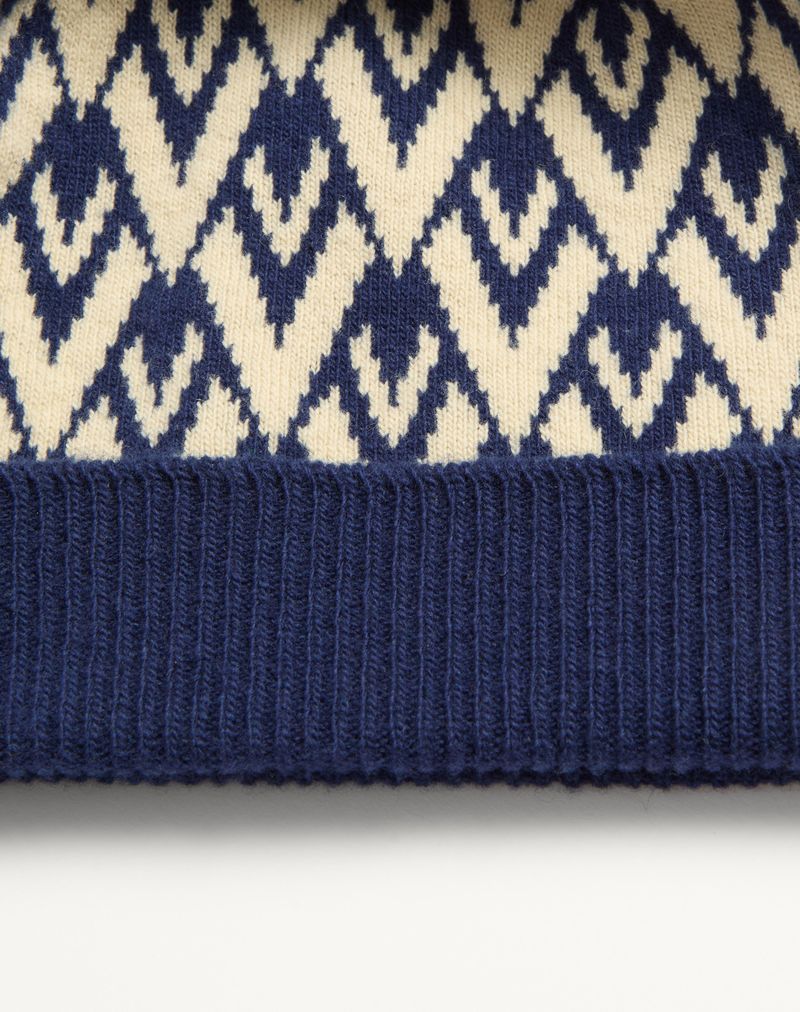 Beanie strikket Toute La V Signature i uld