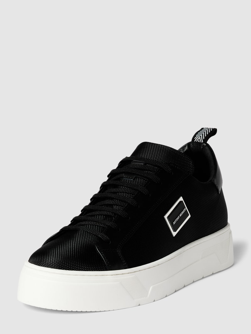 Sneaker mit Label-Details Modell 'PLAKETTE' in schwarz