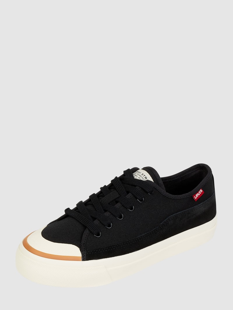 Sneaker aus Canvas und Leder  in schwarz