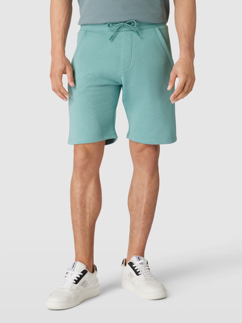 Sweatshorts mit französischen Eingrifftaschen in helltürkis