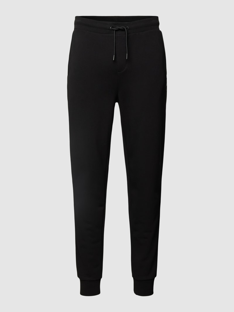 Jogpants mit Label-Patch in schwarz