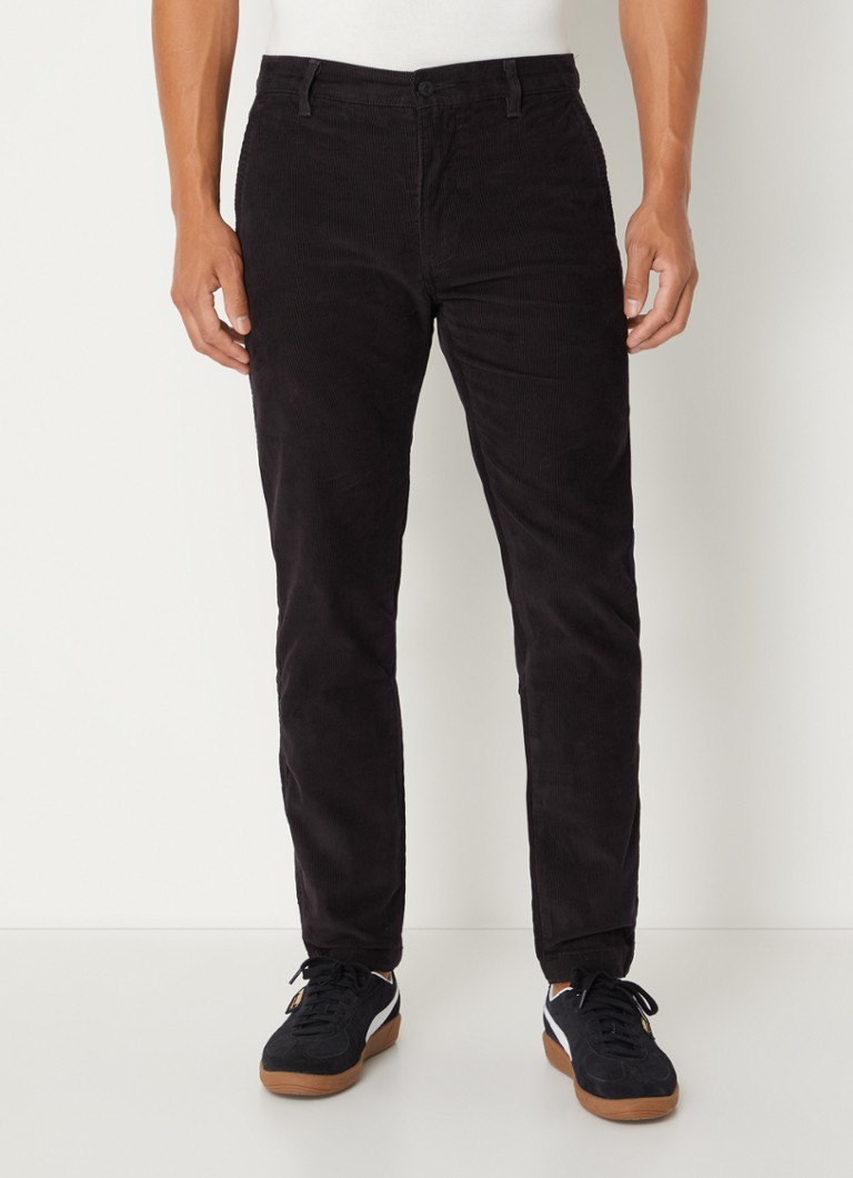 Pantaloni chino din catifea reiată de la Levi's, mulați, cu buzunare laterale.